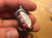 10x Disciples of Caliban - Bent Insignia (11x18mm) 3d printed Similar product (Courtesy of Sander Buurman)